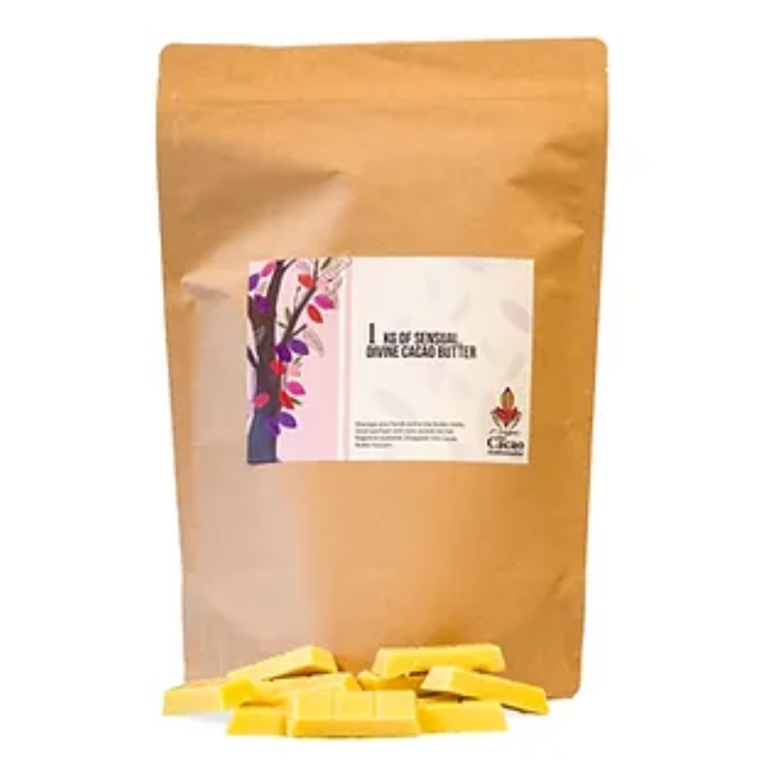 A package of 1kg PNG cacao butter with visible pieces of butter in front, the label shows the product name and a graphic of cacao beans.