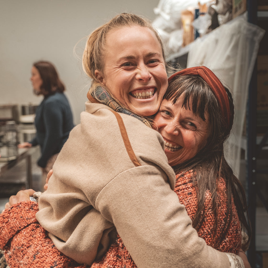 Two women hugging